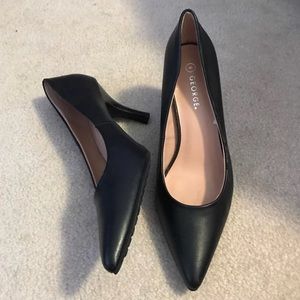 Black pointy heels